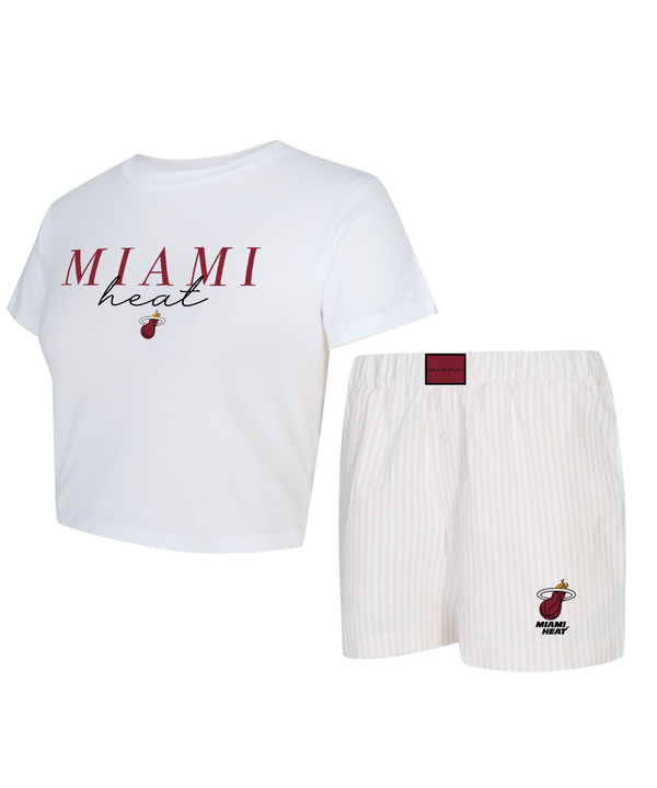 The Concepts Sports Miami HEAT Women's Top & Short Set features a white longline cropped top with a red logo and text, paired with relaxed-fit white cotton shorts with beige stripes and a small Miami Heat logo on the left leg.