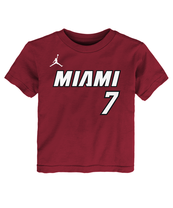 Dress your little one in the Giannis Antetokounmpo Nike Jordan Brand Statement Red Name & Number Toddler Tee by Nike. This maroon kids’ T-shirt features “MIAMI” in bold white letters, a white number 7, and a white basketball player silhouette logo on the chest. Made from 100% cotton for comfort and durability, this standard-fit tee is easy to care for—simply machine wash cold.