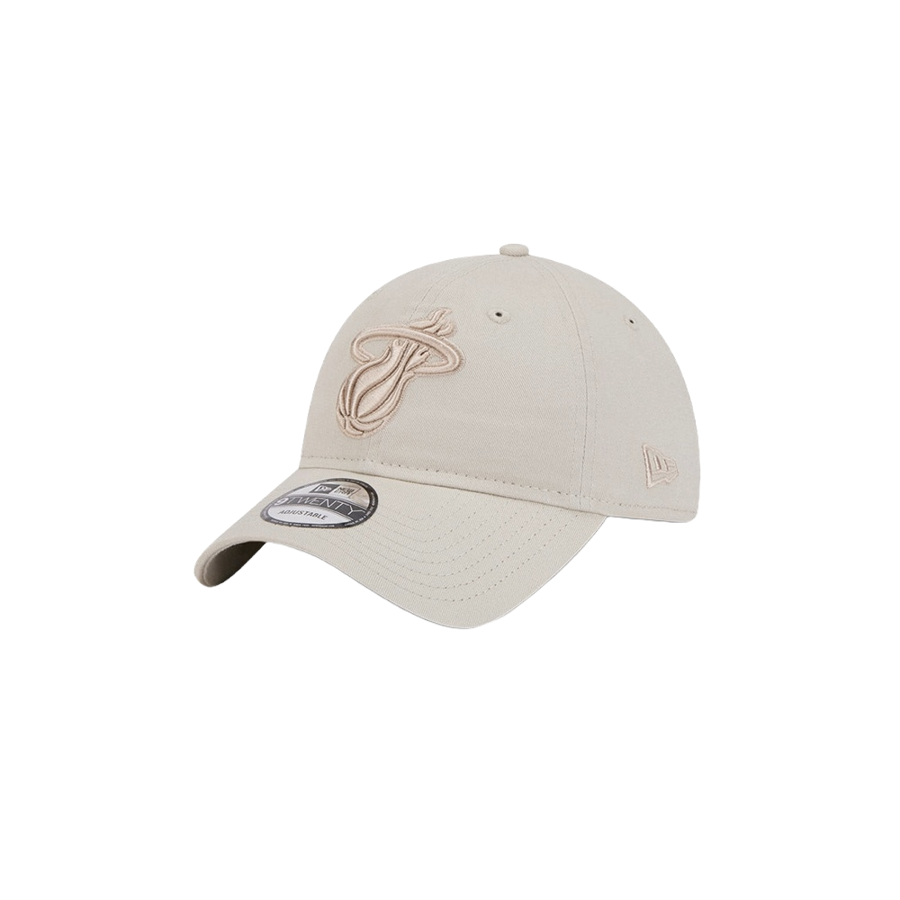 Stone-colored New Era dad hat with Miami HEAT logo embroidered in matching tone.