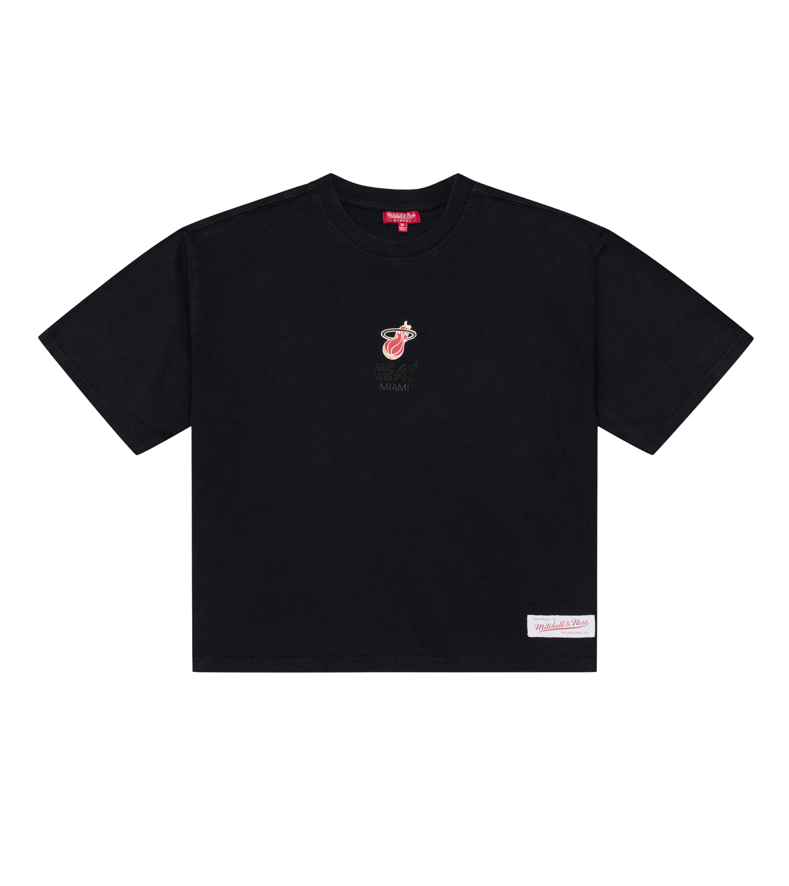 The Mitchell & Ness Miami HEAT Core Logo Women’s Crop Tee is a black, short-sleeve cotton t-shirt with a relaxed fit and cropped length. It features a small Miami Heat logo alongside “Miami” text on the chest and a white rectangular patch near the bottom hem on the left side. This easy-care tee can be simply machine washed and worn.