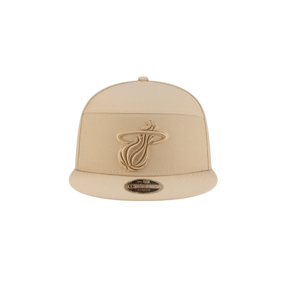 The New Era Miami HEAT Tan Youth Snapback is a beige polyester hat with a flat brim and an embroidered team logo on the front. It's one size fits most, easy to spot clean, and displayed against a plain white background.
