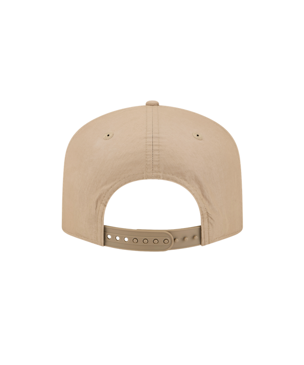 The New Era Miami HEAT Nylon Tan Snapback is a beige cotton-nylon hat with the Miami Heat flaming basketball logo embroidered front, pre-curved visor, bill sticker, and an adjustable fit for most.