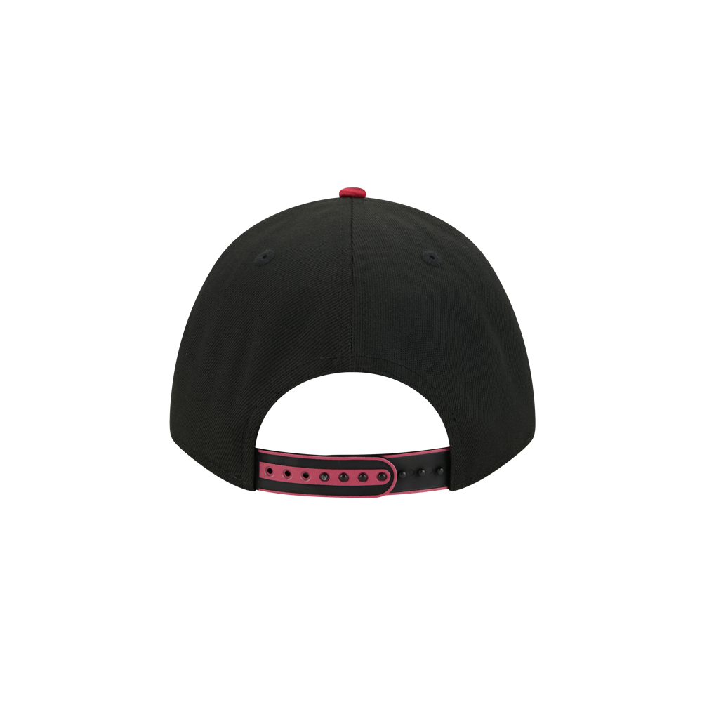 A black New Era Miami HEAT 2025 Tipoff Snapback is shown from the back, featuring an adjustable black snapback strap with red accents and a small red button on top.