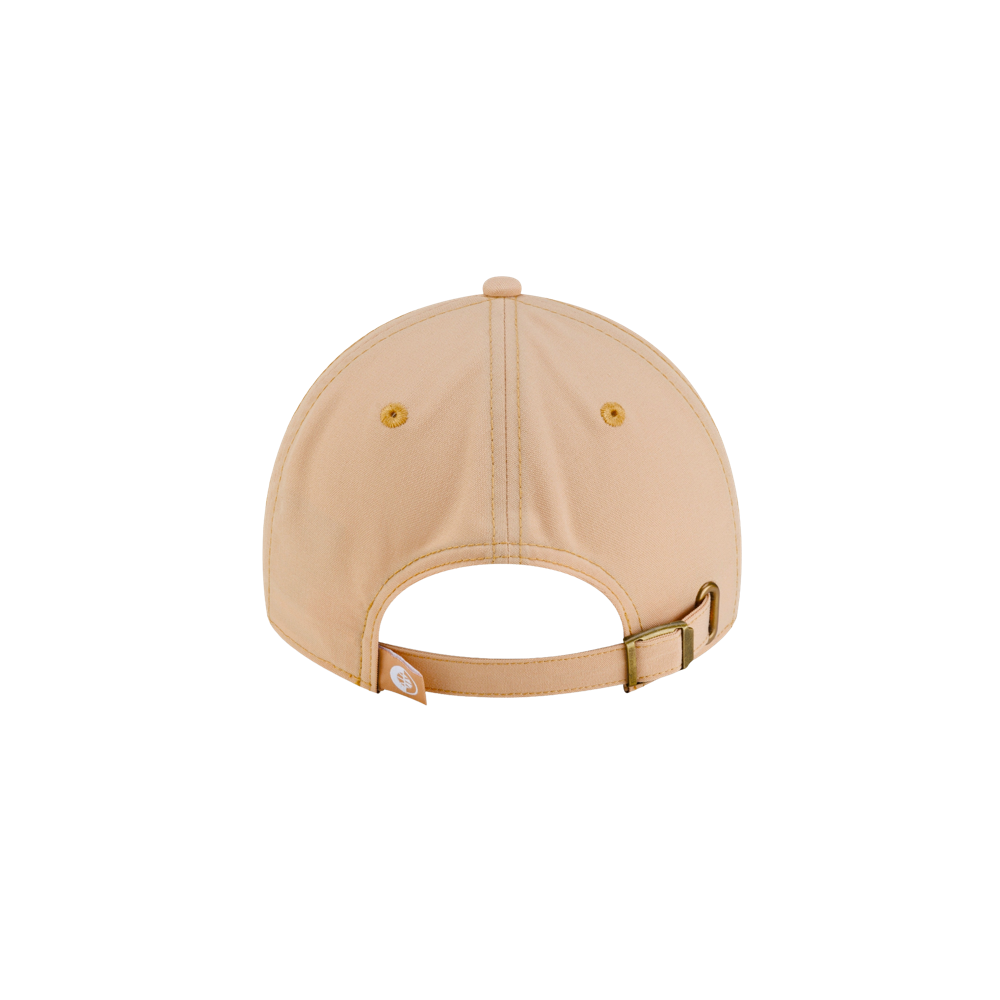 Back view of a light tan Court Culture x New Era Sandbar Dad Hat, featuring an adjustable strap with a gold-tone metal buckle.