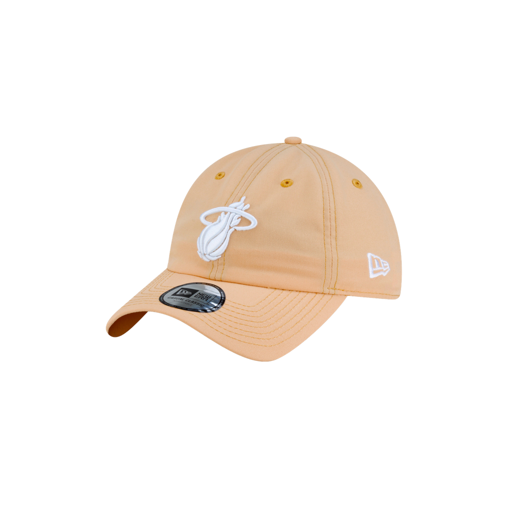 Light orange polyester Court Culture x New Era Sandbar dad hat featuring a white Miami Heat logo on the front.
