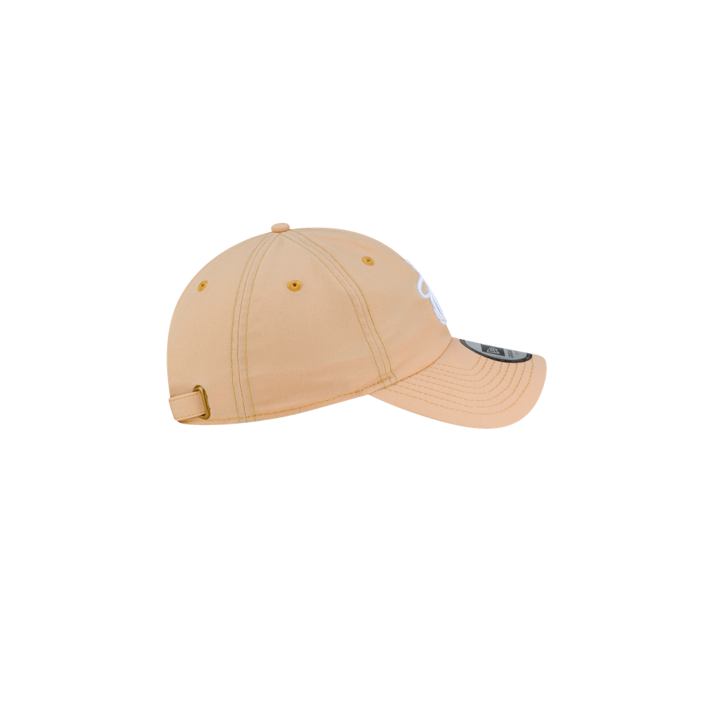 Tan polyester Court Culture x New Era Sandbar Dad Hat with a white logo and an adjustable metal strap at the back, designed in a one size fits most style.