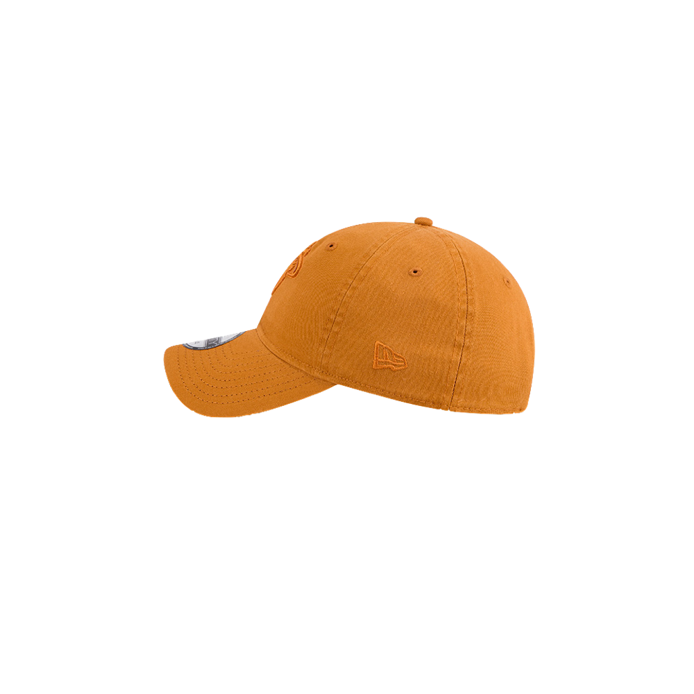 Tan New Era dad hat with embroidered Miami HEAT logo and adjustable strap. - New Era Miami HEAT Adjustable Tan Dad Hat