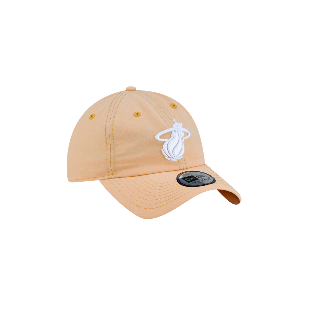 Peach-colored polyester Court Culture x New Era Sandbar Dad Hat featuring a white Miami Heat logo embroidered on the front.