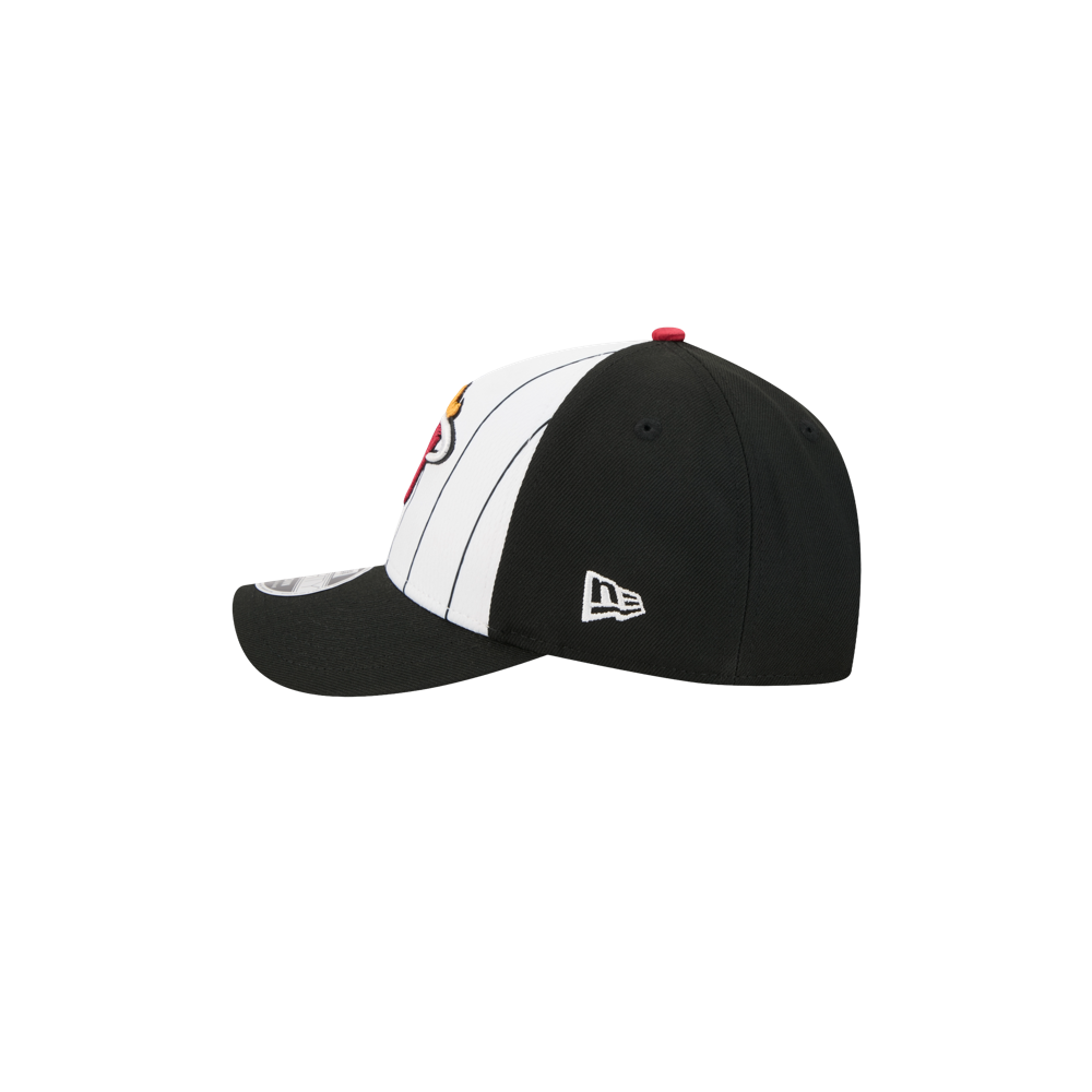 The New Era Miami HEAT 2025 Tipoff Snapback is a black and white cap featuring vertical stripes on the front, a small red top button, and the white New Era logo on the side, combining sporty flair with bold Miami HEAT style.