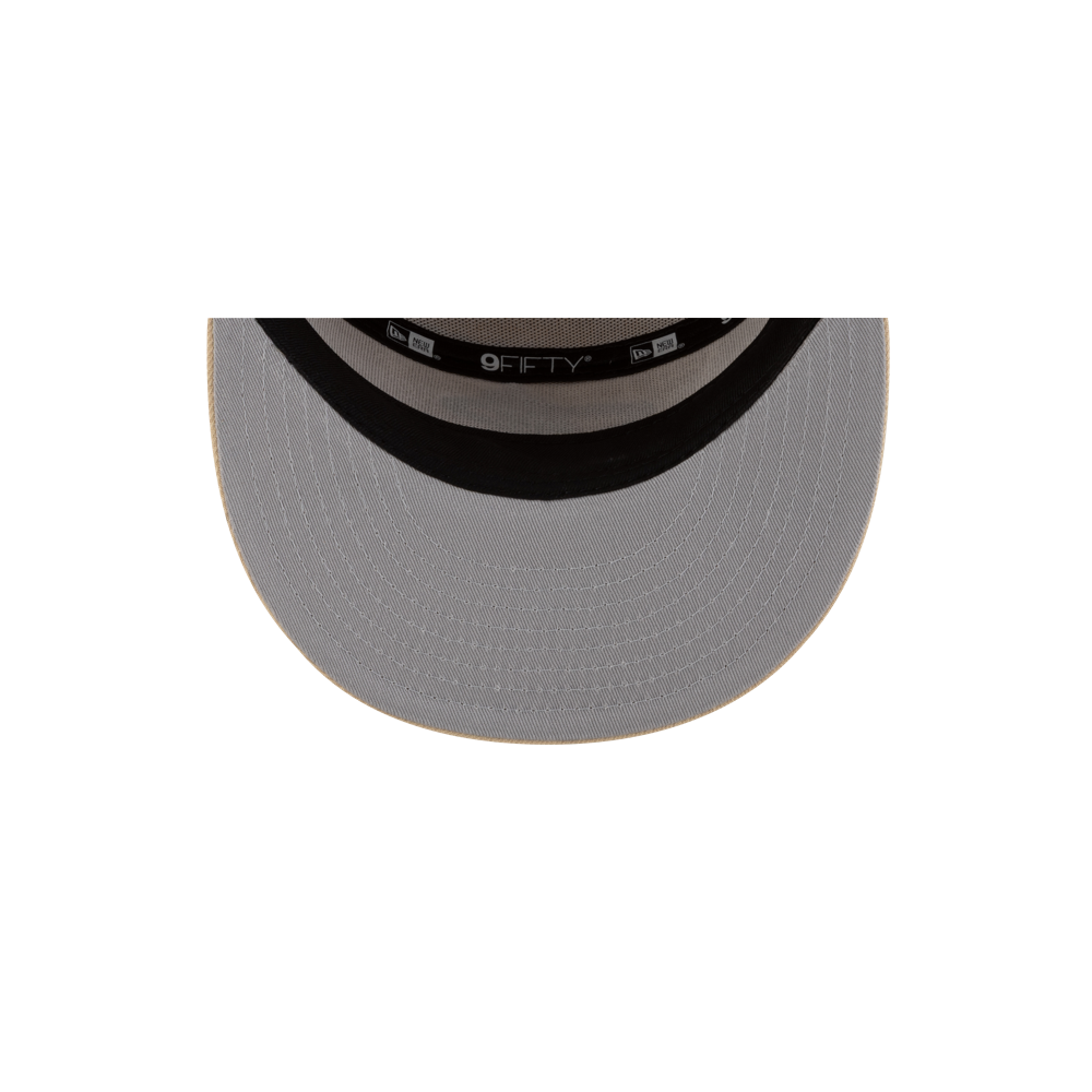 Top-down view of the underside of a gray polyester New Era Miami HEAT Tan Youth Snapback brim with black lining, visible stitching, and 9FIFTY label; one size fits most and spot clean recommended. Brand: New Era.