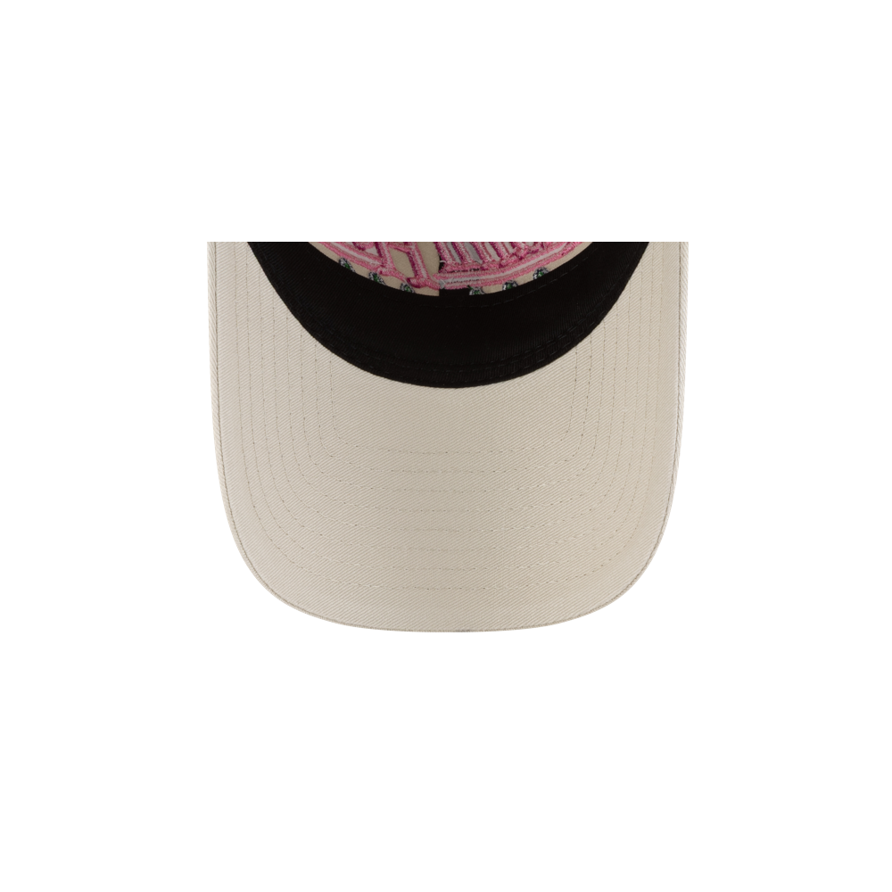 A close-up of the underside brim of the beige Court Culture 