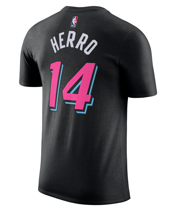 The Nike Tyler Herro Original Vice Nights Name & Number Tee is a black, standard-fit cotton t-shirt with “Miami” in pink and teal, number 14 on the front, and NBA and Nike logos by the collar. Machine washable for easy care.