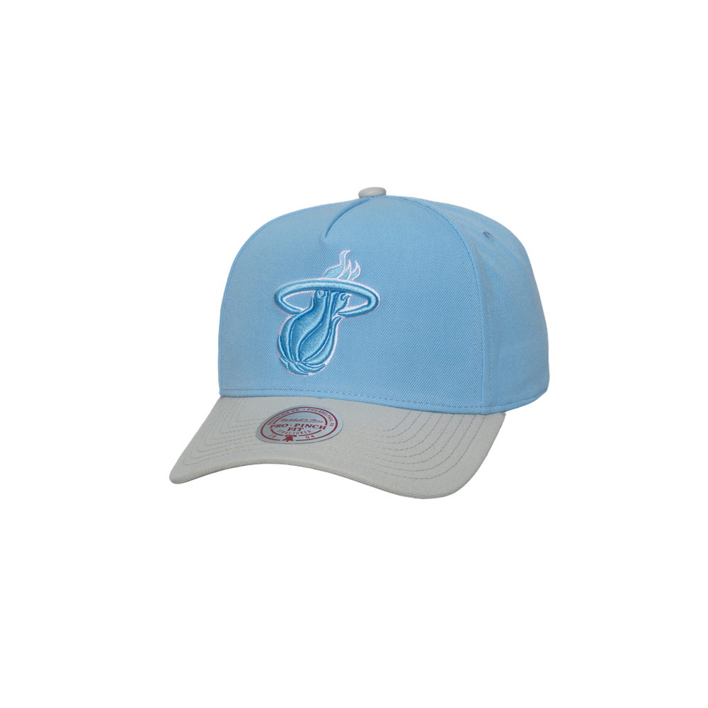 The Mitchell & Ness Miami HEAT Blue Logo Snapback is a light blue baseball cap with a gray brim and the team’s white and blue logo on the front. This stylish one-size hat is perfect for any Miami Heat fan. Brand: Mitchell & Ness.