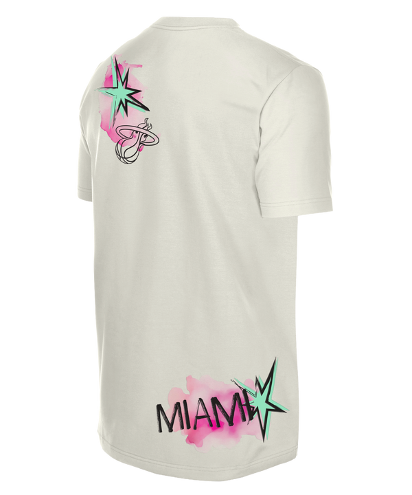 The New Era Miami HEAT 305 Punk Core Tee is a white cotton t-shirt with a neon green flaming basketball and pink brushstroke Miami Heat 305 graphic, standard fit, machine washable, and features the New Era logo on the left sleeve.