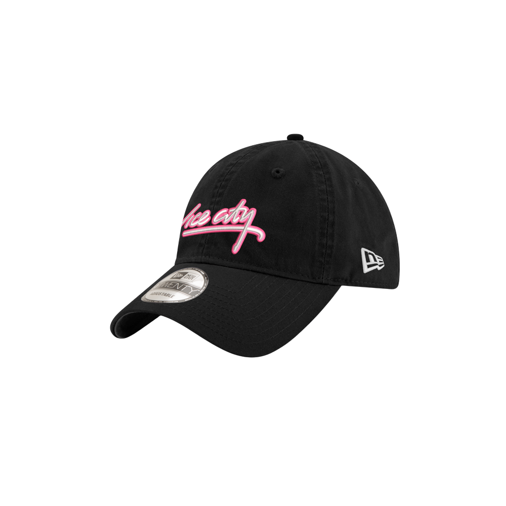 The Court Culture x New Era Vice City Logo Dad Cap features black cotton, pink and white Vice City script on front, curved brim, side New Era logo, and sticker on bill. One size fits most.