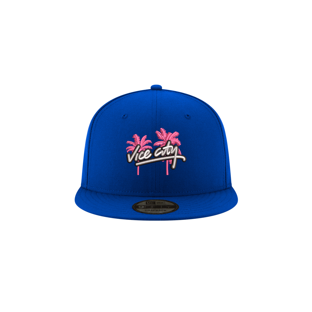 Court Culture x New Era Vice City snapback in blue 100% polyester, featuring an embroidered design of two pink palm trees above the words Vice City in white script.
