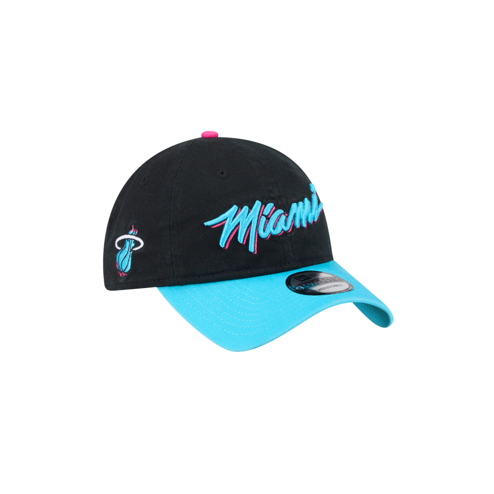 The New Era Miami HEAT Original Vice Nights Wordmark Dad Hat features a black crown, turquoise brim, and “Miami” in pink and blue script on the front. One size fits most; spot clean to keep fresh.