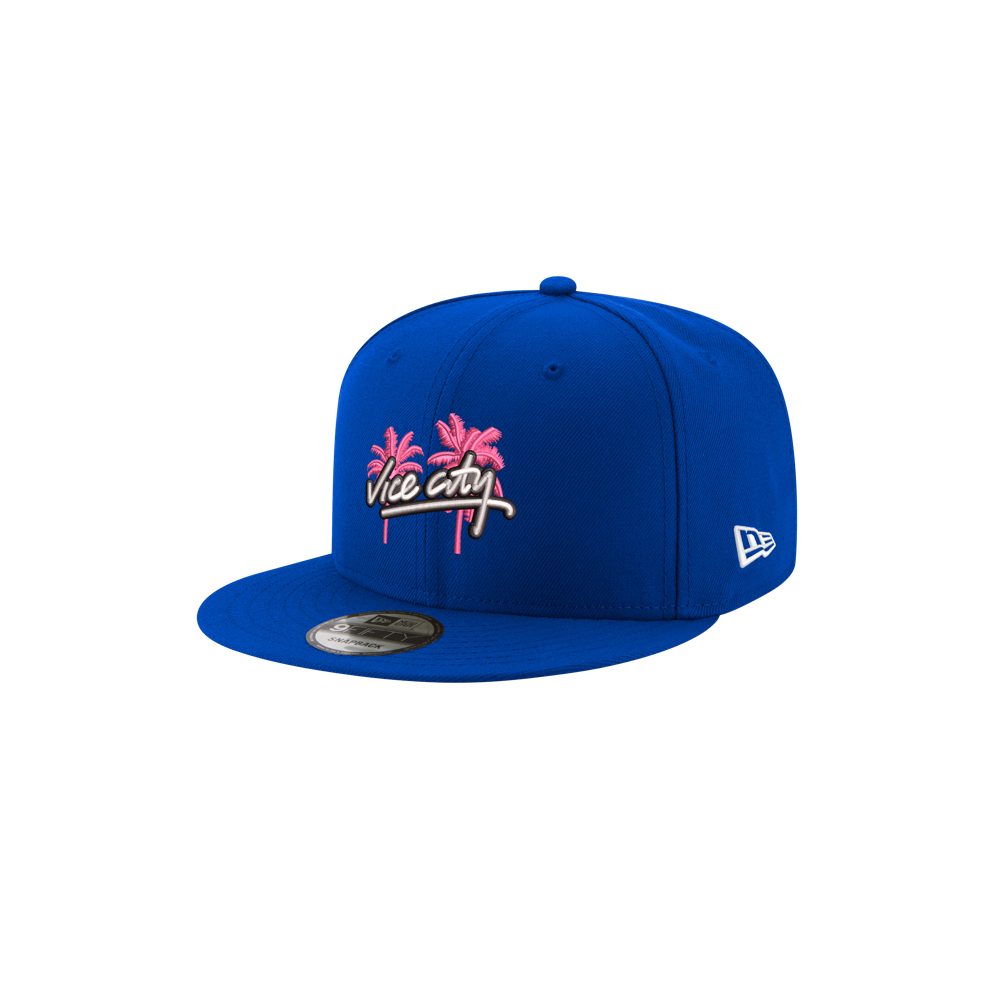 Court Culture x New Era Vice City royal blue snapback cap featuring an embroidered design of pink palm trees over the words Vice City in white script.