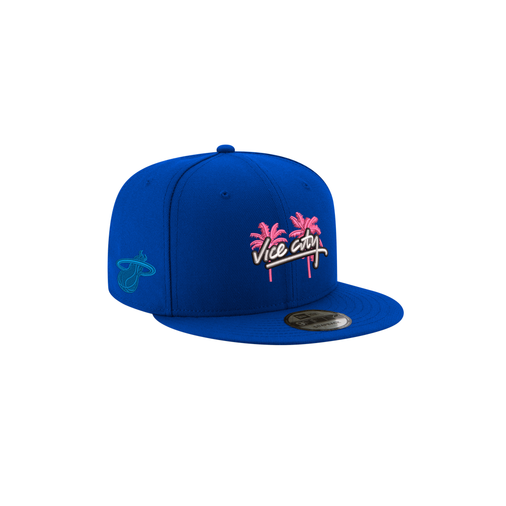 Blue 100% polyester Court Culture x New Era Vice City snapback featuring a pink palm tree and neon sign graphic on the front, with a basketball logo on the side.
