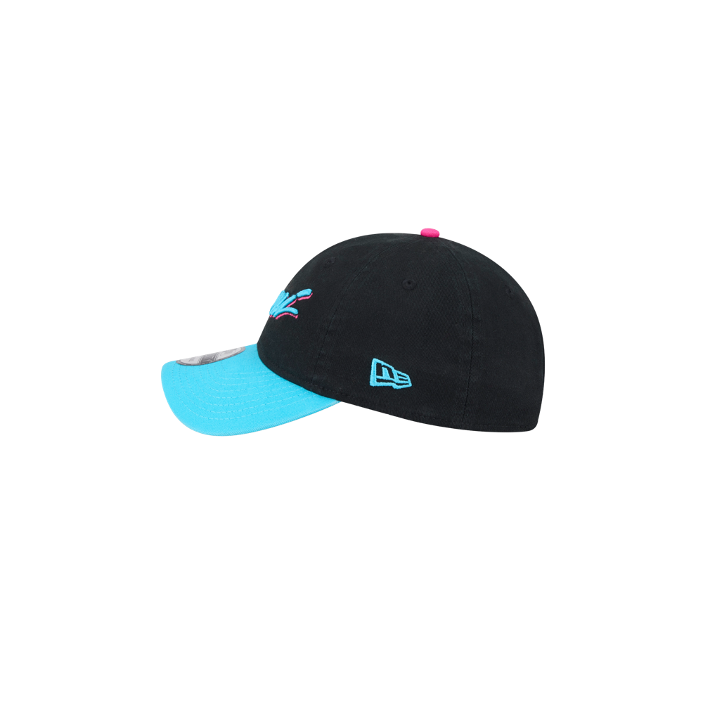 The New Era Miami HEAT Original Vice Nights Wordmark Dad Hat is a black cotton baseball cap with a bright blue brim, blue side logo, and colorful embroidery above the brim. One size fits most; spot clean. Displayed on a plain white background.