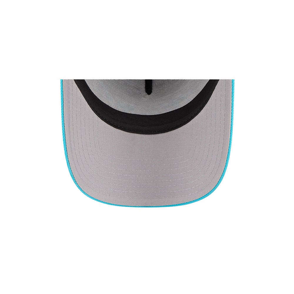 Top view of the New Era Miami HEAT Original Vice Nights Trucker Snapback by New Era, featuring gray polyester, a black inner band, and blue brim trim. One size fits most and easy to spot clean. Set against a plain white background.