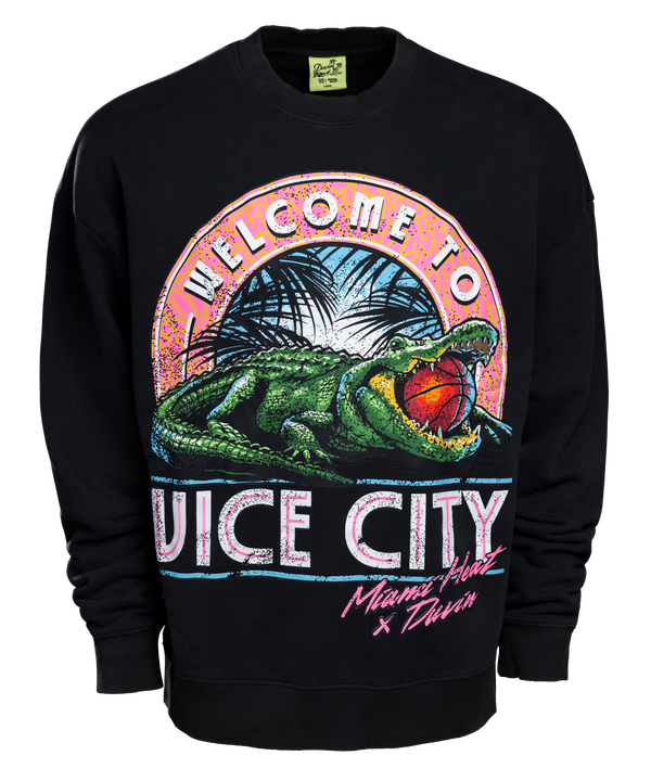 The Court Culture x Duvin Welcome to Vice City Crewneck features premium black fleece with a vibrant alligator basketball graphic, sunset and palm trees, plus Welcome to Juice City and Miami Heat x Duvin text.