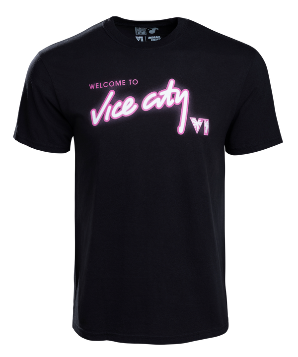 Court Culture Welcome to Vice City Tee: Black, 100% cotton, standard fit with pink neon WELCOME TO vice city text and a small white V1 logo on the chest. Machine wash cold. Brand: Court Culture.