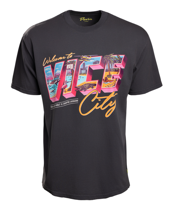The Court Culture x Duvin Vice City Postcard Tee features a dark gray color, bold Welcome to Vice City text with palm tree graphics, and is made from midweight cotton for a retro beach vibe in a standard fit.