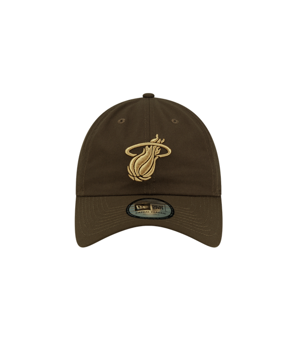 Court Culture x New Era Olive Dad Cap in olive polyester featuring an embroidered gold Miami Heat basketball logo on the front.