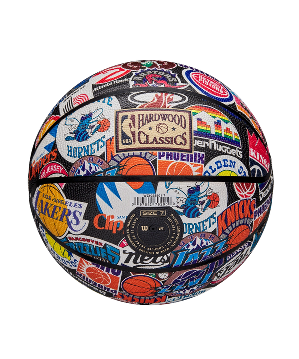 The Wilson All-Team Retro Basketball by Wilson features vibrant, vintage team logos and names on its Pure Feel Cover, showcasing classic teams with colorful graphics.