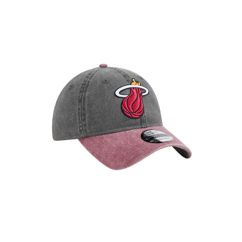 Black washed dad hat with gray crown and faded red brim, embroidered Miami HEAT logo, adjustable strap. - New Era Miami HEAT Black Washed Dad Hat