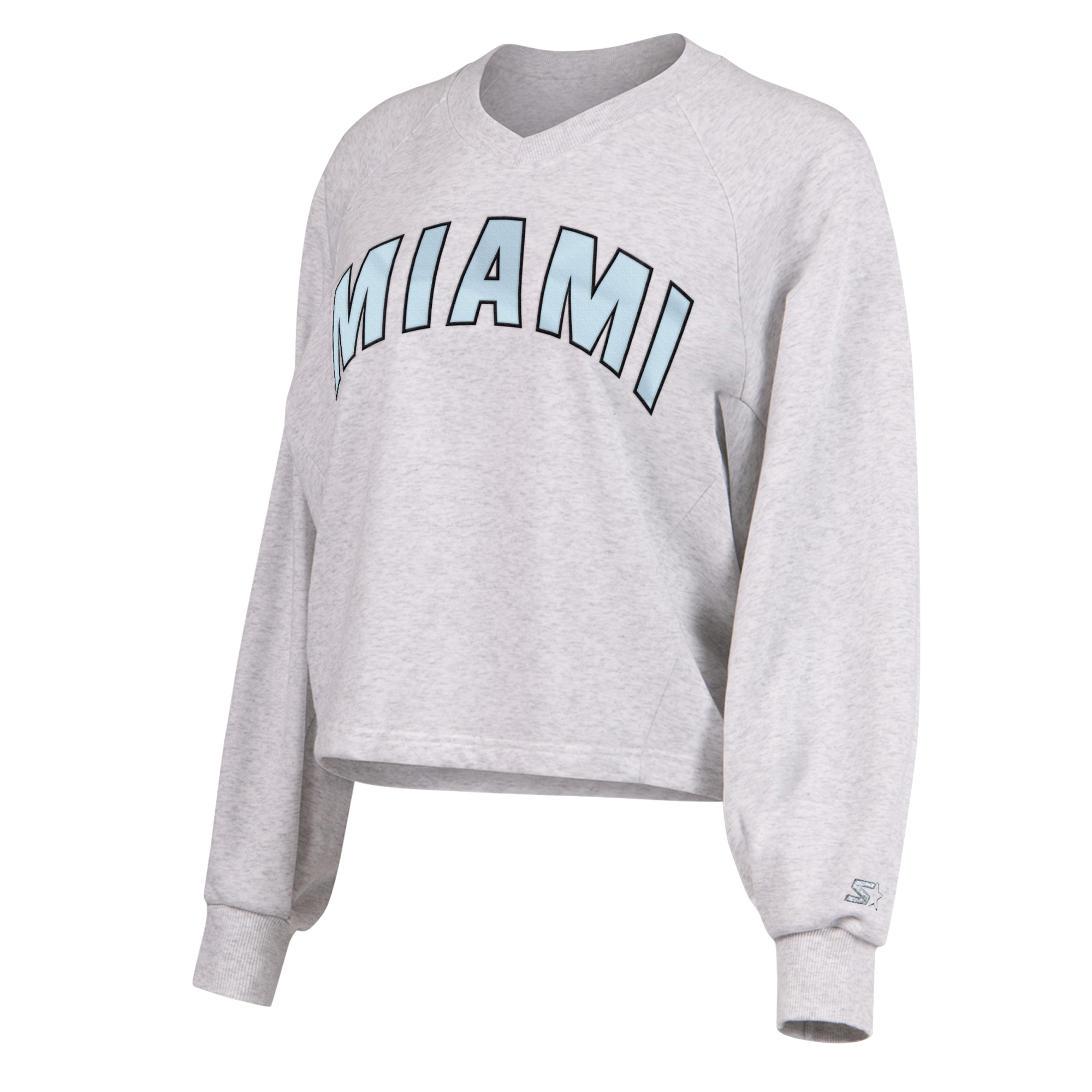 The G-III Miami HEAT Faceoff Women's Crewneck by G-III Sports is a light gray, relaxed-fit sweatshirt with MIAMI in large, light blue outlined letters across the chest. Features ribbed cuffs, crew neck, cotton-poly blend. Machine wash cold.