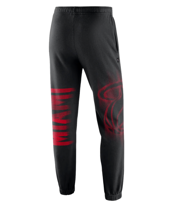 Nike Miami HEAT Standard Issue Fleece Pants in black, featuring a white drawstring, a red basketball logo on the right leg, and red MIAMI lettering on the left leg.