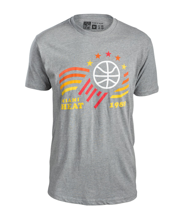 Gray short-sleeve tee with Miami HEAT basketball logo, orange and yellow graphic stripes, and five stars above. - American HEAT Tee