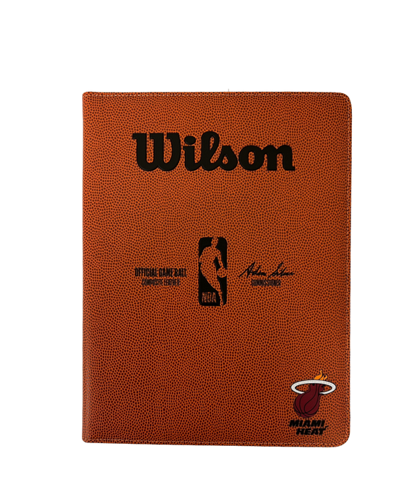 Orange Wilson Miami HEAT padfolio with black logo and NBA emblem on front cover.